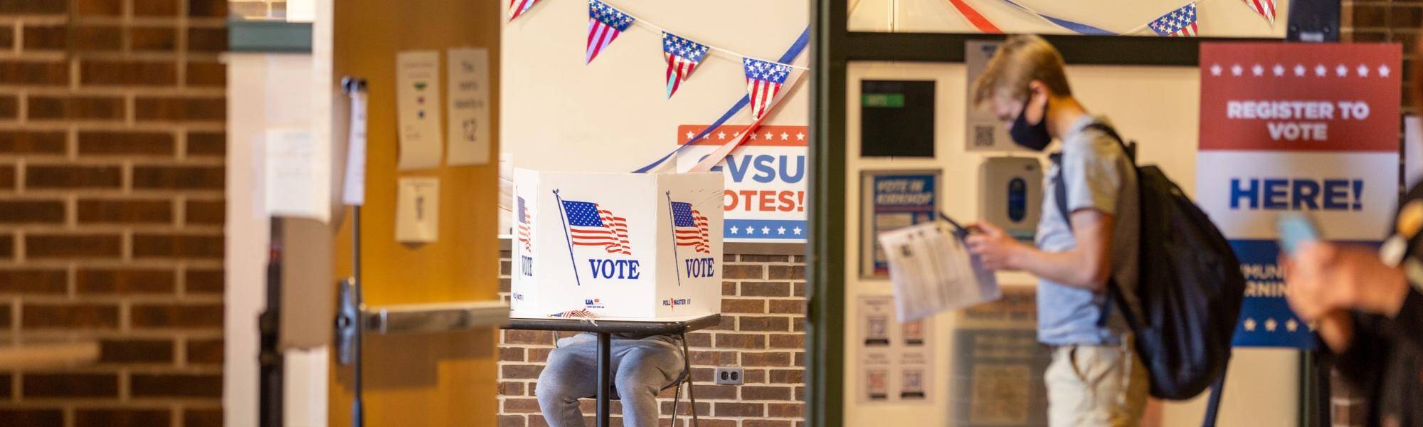 Voter waiting to vote at the GVSU polling booth